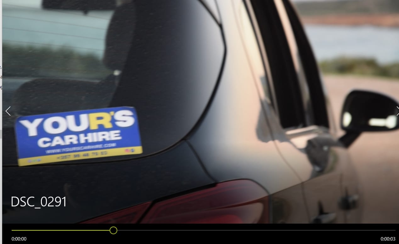 YOUR'S CAR HIRE branded vehicle